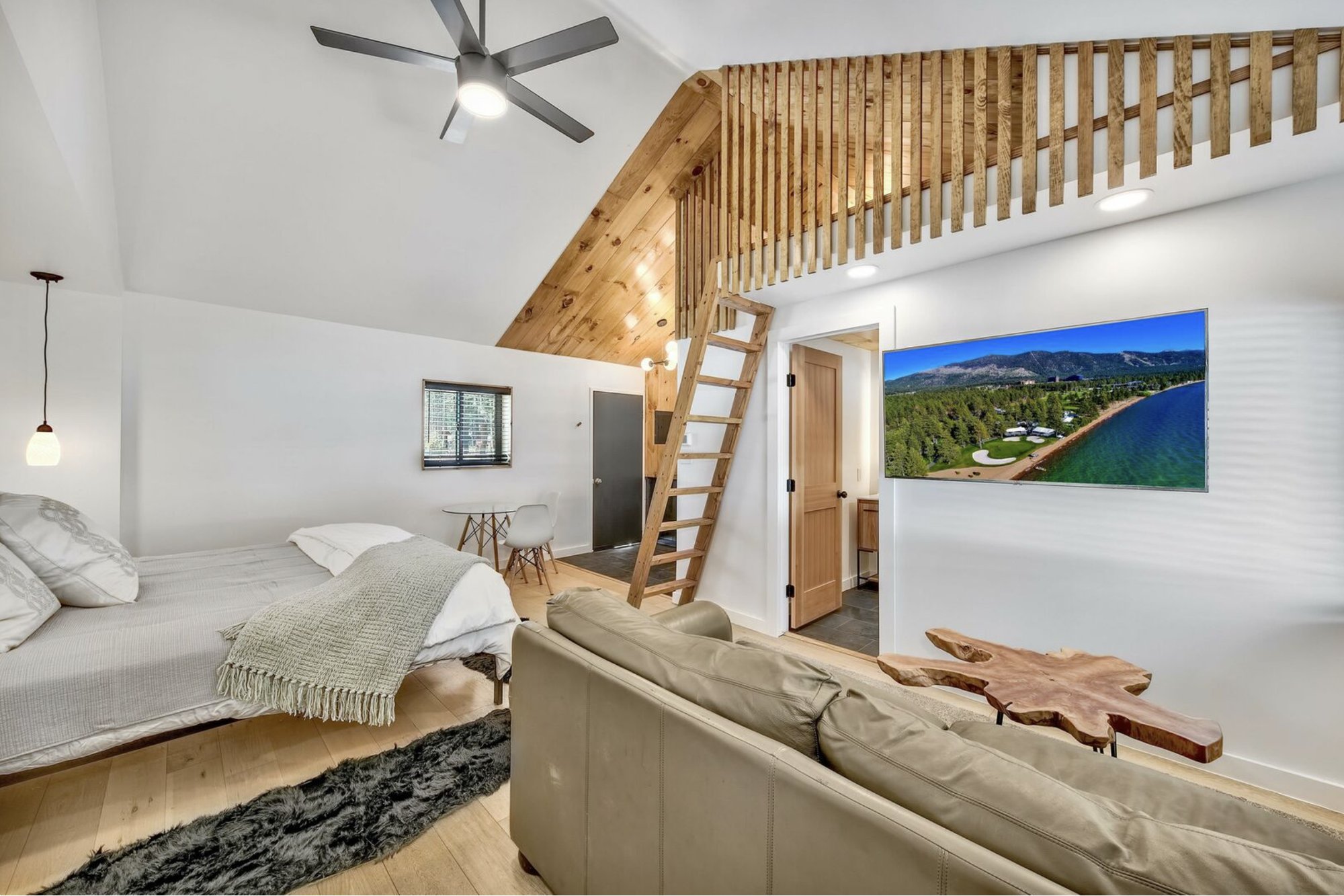 8638 Trout Ave. &mdash; vaulted studio unit with sleeping loft, ladder, and knotty pine ceiling